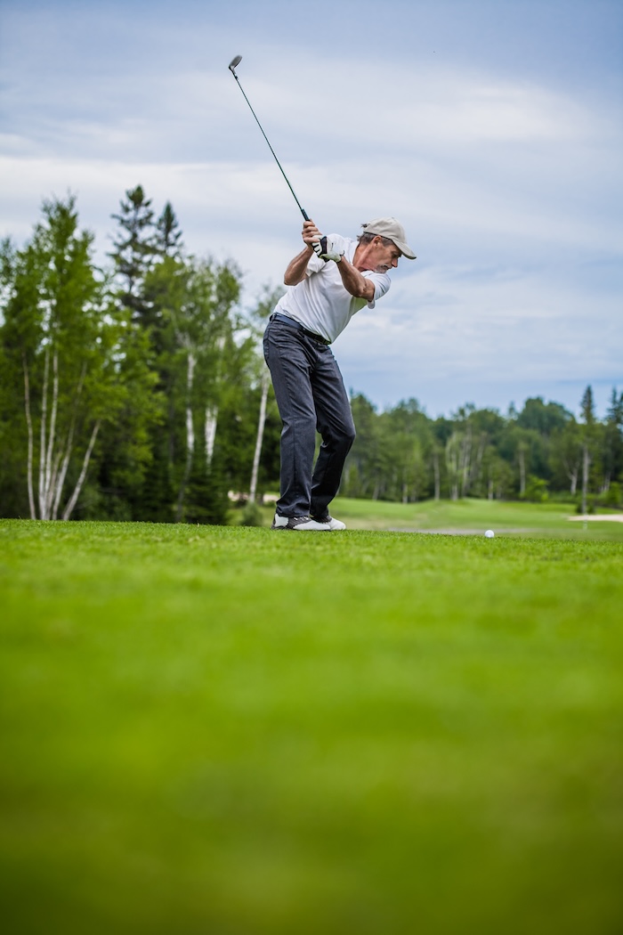 Golfer At The Start With Copyspace For Your Text golf-swinger